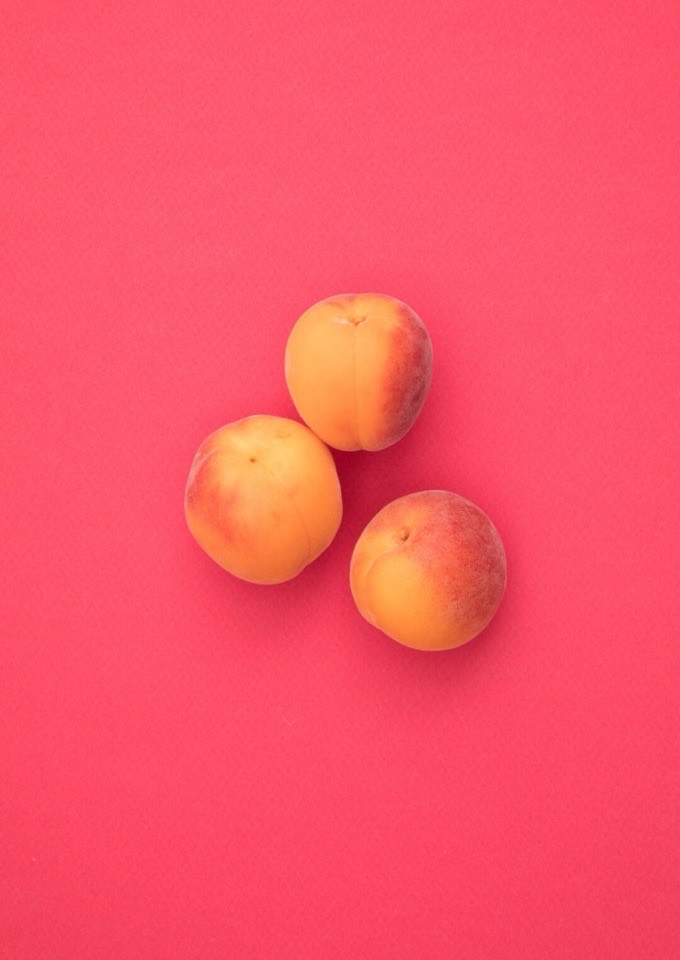 Three ripe apricots